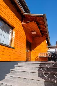 a building with stairs and a bench on it at Buttermarkt House ``Rooms at the Ring`` in Adenau