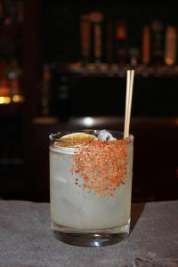 a drink with a straw sitting on a table at Palooza Basecamp in Cascade