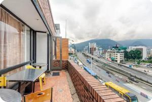 a balcony of a building with a view of a highway at Hospedaje Sary House in Bogotá