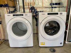two washing machines sitting next to each other at Home Away from Home in Brandon
