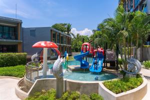 a playground with a water slide and slides at Private Residents in Surin Mida in Surin Beach