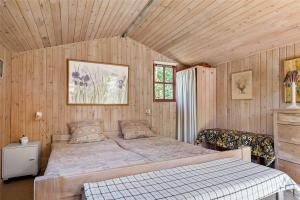 a bedroom with a large bed in a room at SL078-Slagelse-Dybkaervej-36 in Slagelse