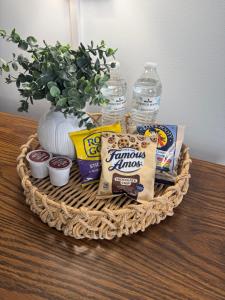 a basket with food and drinks on a table at John Day Motel in John Day +10 photos