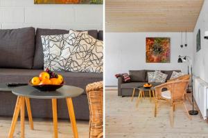 a living room with a couch and a table with a bowl of fruit at FY410-Faaborg-Mosetoften-10-B in Diernæs +15 photos