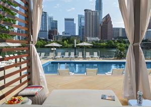 a view from the balcony of a hotel with a pool at Hyatt Regency Austin in Austin