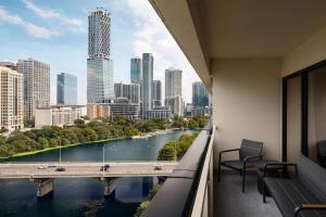 a balcony of a building with a view of a river at Hyatt Regency Austin in Austin
