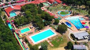an overhead view of an amusement park with two pools at Utulny privat in Veľký Meder