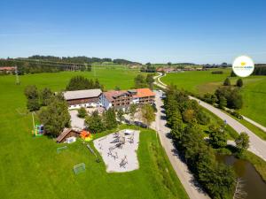 an aerial view of a resort with a park at Familienhotel Löwen in Nesselwang