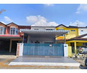 a blue gate in front of a house at 61 StayAtHome in Nibung Tebal