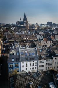 an aerial view of a city with buildings at Jotica Colonia in Cologne