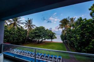 a view of the ocean from the balcony of a resort at Golden Pearl Tangalle Beach in Tangalle