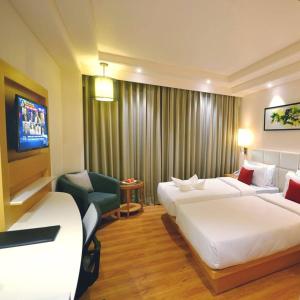 TV a/nebo společenská místnost v ubytování Pearltree Hotels And Resorts