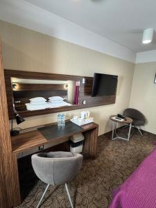 Svetainės erdvė apgyvendinimo įstaigoje Hotel Silver