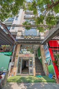 a building with stairs in front of it at AVA Hotel & Apartment in Danang