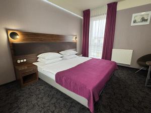 Lova arba lovos apgyvendinimo įstaigoje Hotel Silver dar 29 nuotraukos