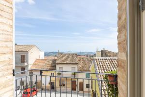 a view from a balcony of buildings at Aghèl Luxury Room in Recanati