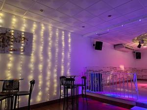 a room with a wall with lights on it at Hotel Meson Fuente del Pino in Olvera +118 photos