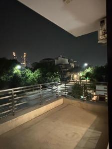 a view of a parking lot at night at Sarla Residency in Noida