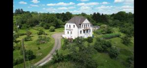 an aerial view of a house in a field at Villa Überblick in Nalbach