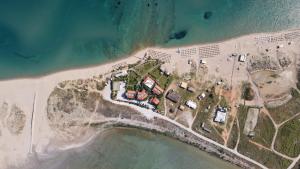 an aerial view of a resort on the beach at Gokceada Surf Egitim Merkezi in Gokceada Town +135 photos