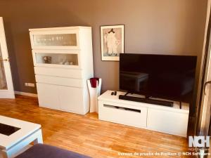 a living room with a large flat screen tv at Angel de la Guarda 18 in Soria
