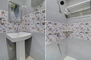 a bathroom with a sink and a mirror at The MoonLight Hotel in Zirakpur