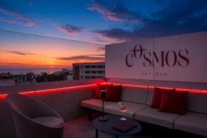 a living room with a couch and red lights at Hotel Costa Málaga - Adults Recommended - by Pierre & Vacances in Torremolinos