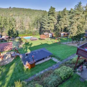 an aerial view of a yard with a house at Marina Orlík in Kowářow