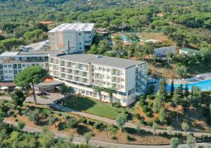 an aerial view of a hotel and a resort at JR Resort Elba International in Capoliveri