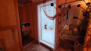 a hallway with a glass door to a room at Momo's villa 2nd room in Aït Ourir +8 photos
