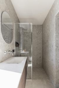 a bathroom with a white sink and a mirror at Mountain air Horishnii in Palyanytsya +15 photos
