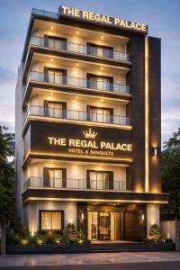 a building with a sign that reads the regal palace at Regal Palace Hotel and Banquets in Patna