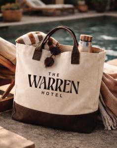 a tote bag that says the warren hotel at The Warren Hotel in Bridgman