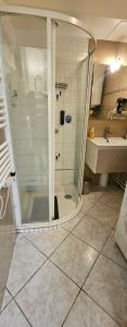 a bathroom with a shower and a sink at Studio Cozy Paris & Disneyland in Bry-sur-Marne