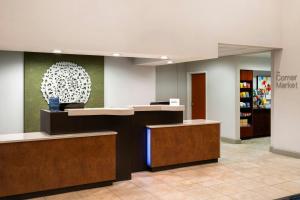 a lobby of a store with a reception counter at Fairfield Inn & Suites by Marriott Denver Aurora/Parker in Foxfield +29 photos