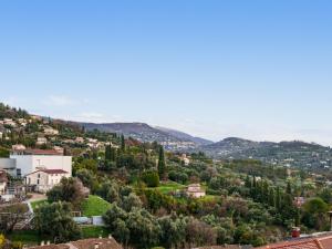 a town on a hill with trees and houses at Virginia N213 - 2p4 in Grasse