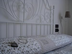 Postel nebo postele na pokoji v ubytování Ai Pianai