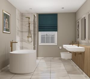 a bathroom with two sinks and a tub at Parade Hotel Bath in Bath