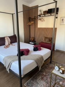 a bedroom with two bunk beds and a table at Stella Sea House2 in Torvaianica