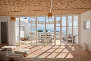 a living room with a view of the ocean at Pistach Océan Maison 4 chambres vue Océan in Wassane