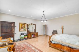 a bedroom with a bed and a large mirror at The Adress beautiful in Midrand +49 photos