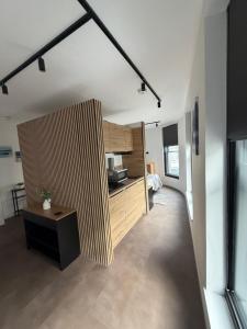 a room with a bed and a desk in it at 70 Bath Street in Saint Helier Jersey