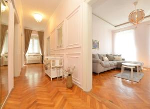 a living room with a couch and a table at Apartment Nikki Kolovare Beach in Zadar +41 photos