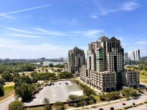 an aerial view of a city with tall buildings at ANTARA Muji Serenity Condo in Putrajaya