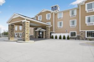 a rendering of a hotel with a parking lot at Cobblestone Hotel & Suites - Eaton in Eaton