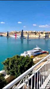 a view of a river with boats in the water at Sea Balcony House in Senglea