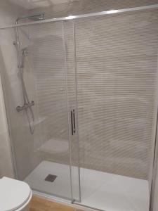 a shower with a glass door in a bathroom at Mi Capricho in Sitio de Calahonda +5 photos
