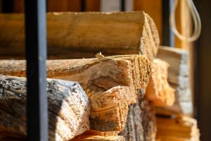 a close up of a stack of wood at 1126 Western Road in Grand Lake
