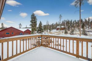 a view from the deck of a cabin in the snow at 21 GCR 4435 in Grand Lake +36 photos