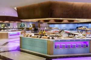 a large kitchen with a buffet of food at Gran Tacande Wellness & Relax Costa Adeje in Adeje